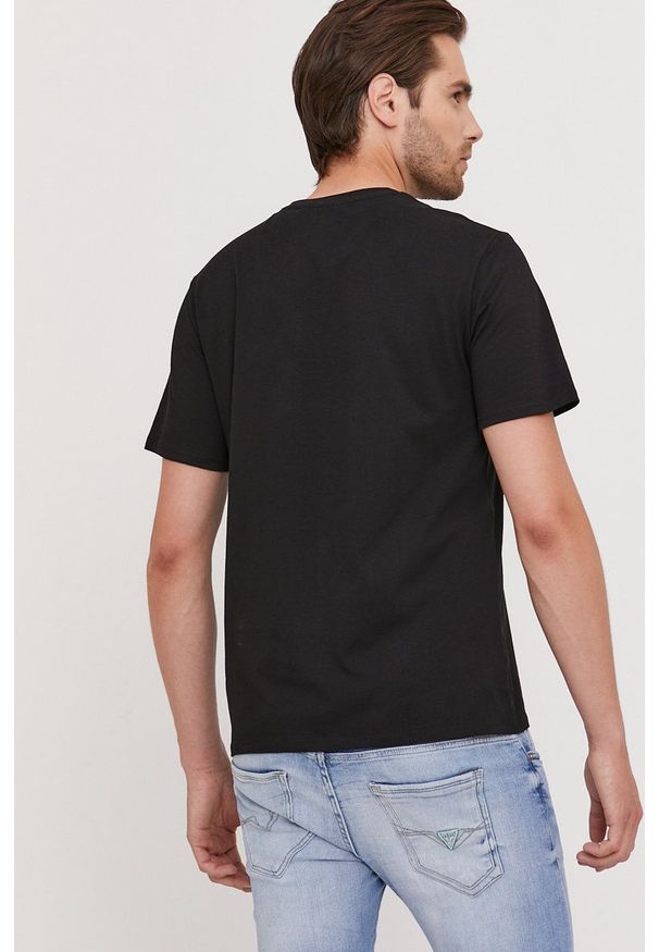 Guess - T-shirt z kolekcji urodzinowej. Okazja: na urodziny. Kolor: czarny. Wzór: nadruk. Styl: casual