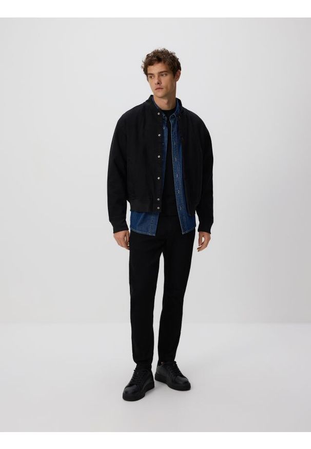 Reserved - Jeansy skinny fit - czarny. Kolor: czarny. Materiał: jeans