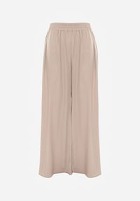 Renee - Beżowe Szerokie Spodnie z Gumką w Talii Carleny. Kolor: beżowy. Materiał: wiskoza, tkanina #4
