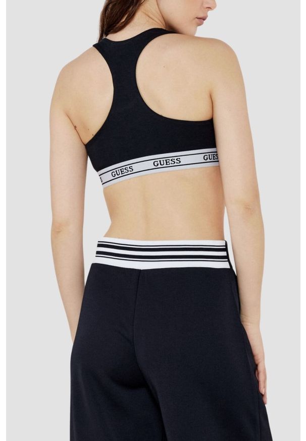 Guess - GUESS Czarny damski top sportowy Aline. Kolor: czarny. Styl: sportowy