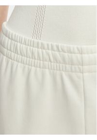 Lacoste Spodnie dresowe XF7604 Biały Regular Fit. Kolor: biały. Materiał: bawełna #3