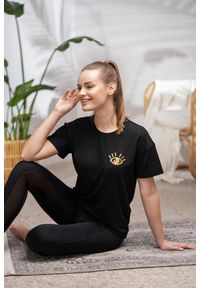 MOONHOLI - T-shirt do jogi Moonholi Awaken z krótkim rękawem. Kolor: czarny. Długość rękawa: krótki rękaw. Długość: krótkie. Sport: joga i pilates