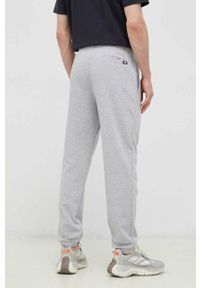 New Balance spodnie dresowe kolor szary z nadrukiem MP31539AG-9AG. Kolor: szary. Materiał: dresówka. Wzór: nadruk #3