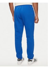 Adidas - adidas Spodnie dresowe Trefoil Essentials IR7806 Niebieski Slim Fit. Kolor: niebieski. Materiał: syntetyk, bawełna