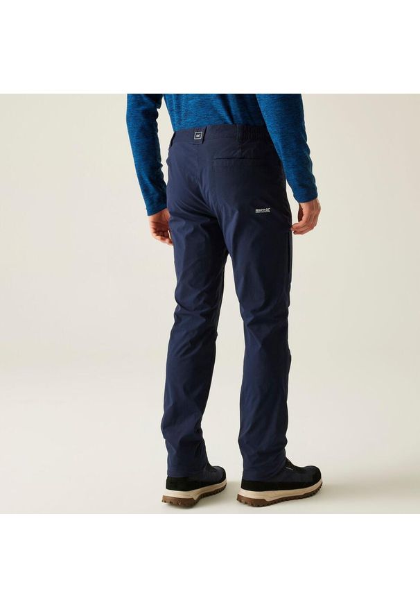 Regatta - Spodnie męskie zimowe ocieplane Highton. Kolor: niebieski. Materiał: materiał. Sezon: zima. Sport: turystyka piesza