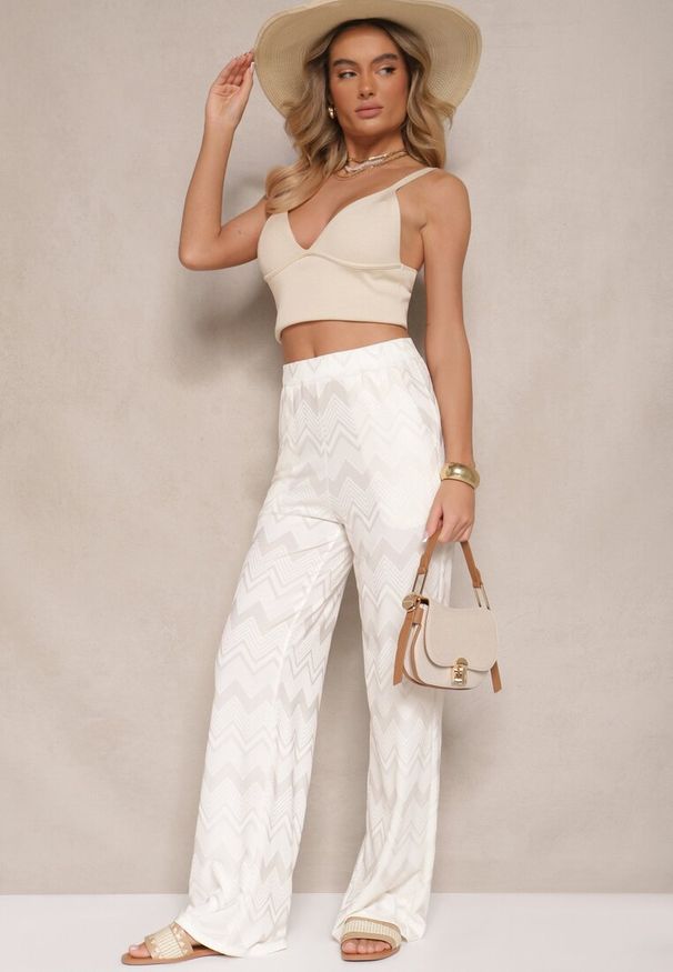 Renee - Jasnobeżowe Spodnie z Wiskozą o Szerokim Kroju High Waist Weralis. Okazja: na co dzień. Stan: podwyższony. Kolor: beżowy. Materiał: wiskoza. Styl: elegancki, casual