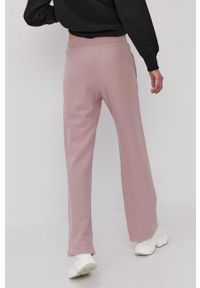 Champion Spodnie 113370 damskie kolor różowy gładkie. Kolor: różowy. Materiał: dzianina. Wzór: gładki #2