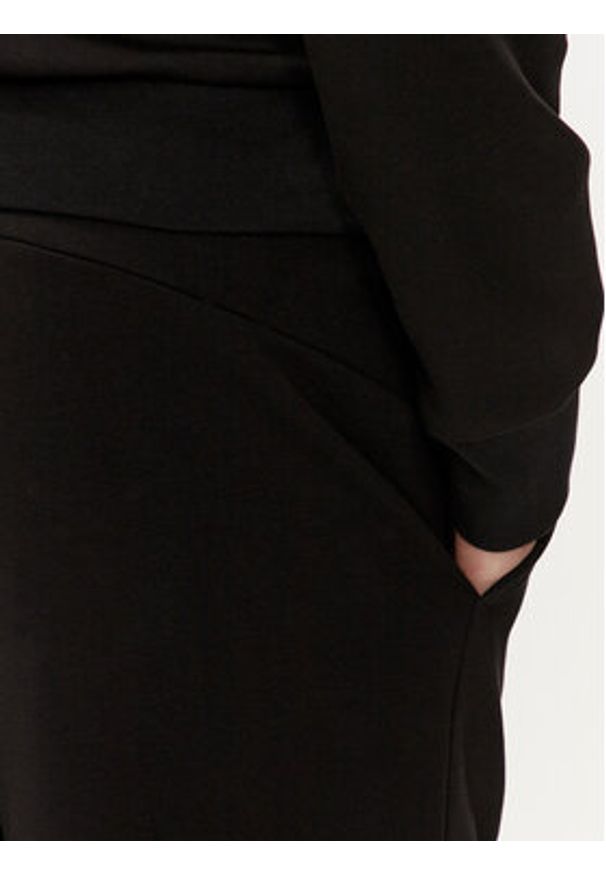 Calvin Klein Spodnie dresowe Color Embossed Logo K10K112688 Czarny Regular Fit. Kolor: czarny. Materiał: bawełna