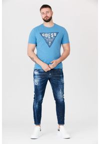 Guess - GUESS Niebieski t-shirt męski z dużym logo. Kolor: niebieski. Wzór: nadruk