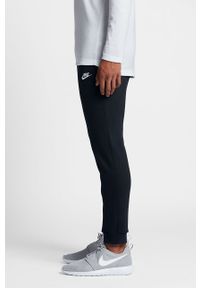 Nike - Spodnie. Kolor: czarny. Materiał: bawełna, poliester, dzianina. Wzór: gładki #3