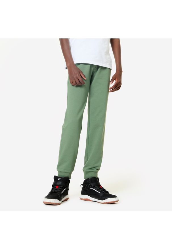 DOMYOS - Spodnie dresowe dla dzieci. Kolekcja: plus size. Kolor: zielony. Materiał: dresówka. Sport: joga i pilates