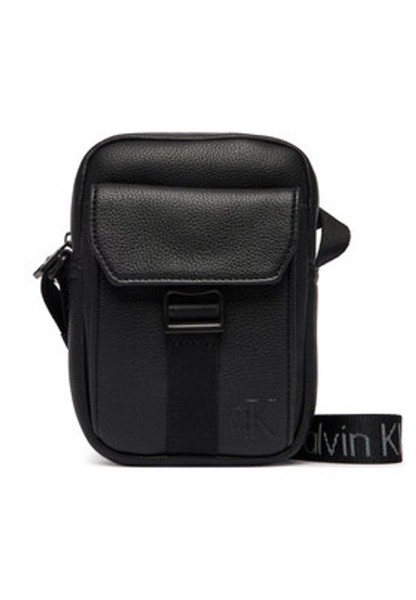 Calvin Klein Saszetka Webbing Strap Slim Reporter LV04D3281G Czarny. Kolor: czarny. Materiał: skóra