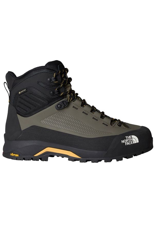 Buty męskie The North Face Verto Gore-Tex Mid 0A83NB3F91 - zielono-czarne. Kolor: czarny, zielony, wielokolorowy. Materiał: guma, skóra. Szerokość cholewki: normalna. Technologia: Gore-Tex. Sport: turystyka piesza