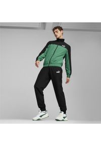 Puma - Męski dres z tkaniny PUMA Archive Green. Kolor: zielony, czarny, wielokolorowy. Materiał: tkanina, dresówka. Wzór: ze splotem. Sport: fitness