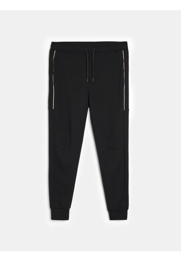 Sinsay - Spodnie dresowe jogger - czarny. Kolor: czarny. Materiał: dresówka