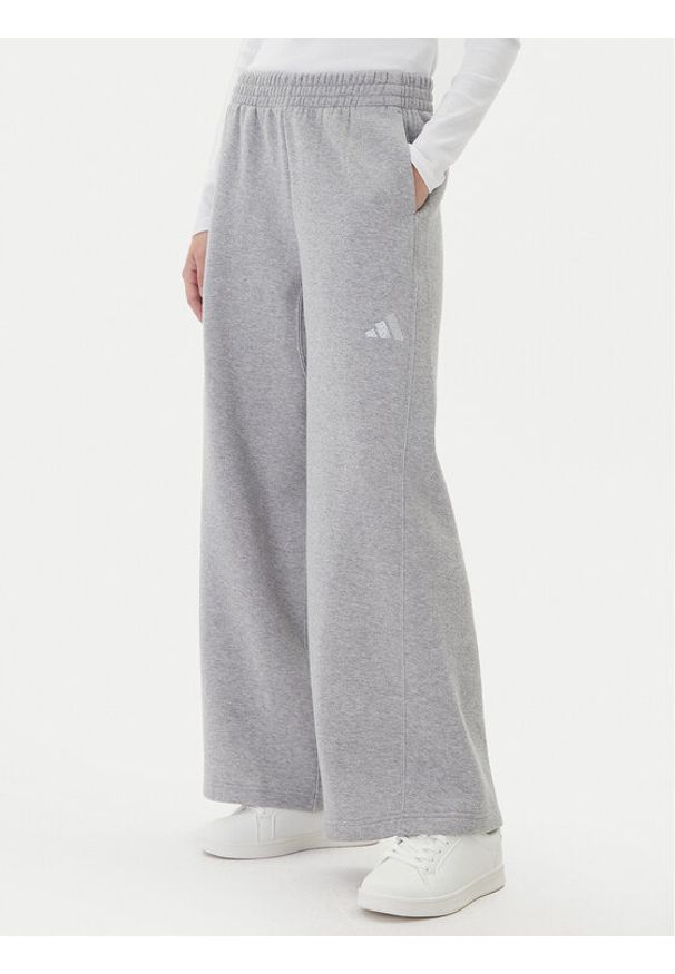 Adidas - adidas Spodnie dresowe ALL SZN Holiday Glitter Fleece JV5758 Szary Loose Fit. Kolor: szary. Materiał: bawełna