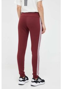 Adidas - adidas spodnie dresowe kolor bordowy z aplikacją. Kolor: czerwony. Materiał: dresówka. Wzór: aplikacja #2