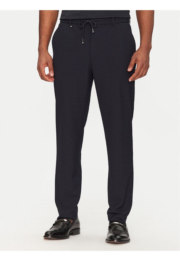 BOSS Spodnie materiałowe C-Perin 50540791 Granatowy Tapered Fit. Kolor: niebieski. Materiał: syntetyk