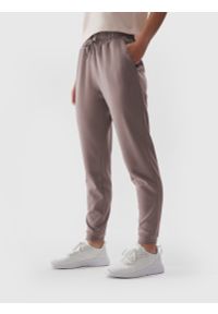 4f - Spodnie dresowe joggery damskie. Kolor: beżowy. Materiał: dresówka