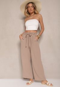 Renee - Ciemnobeżowe Spodnie z Wiskozą o Szerokim Kroju High Waist z Wiązaniem Ivelwia. Stan: podwyższony. Kolor: beżowy. Materiał: wiskoza. Sezon: lato #5