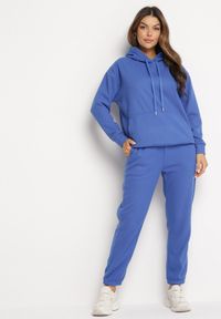 Born2be - Niebieski Bawełniany Komplet Dresowy z Bluzą i Spodniami Zansira. Kolor: niebieski. Materiał: bawełna, dresówka. Sport: turystyka piesza #3