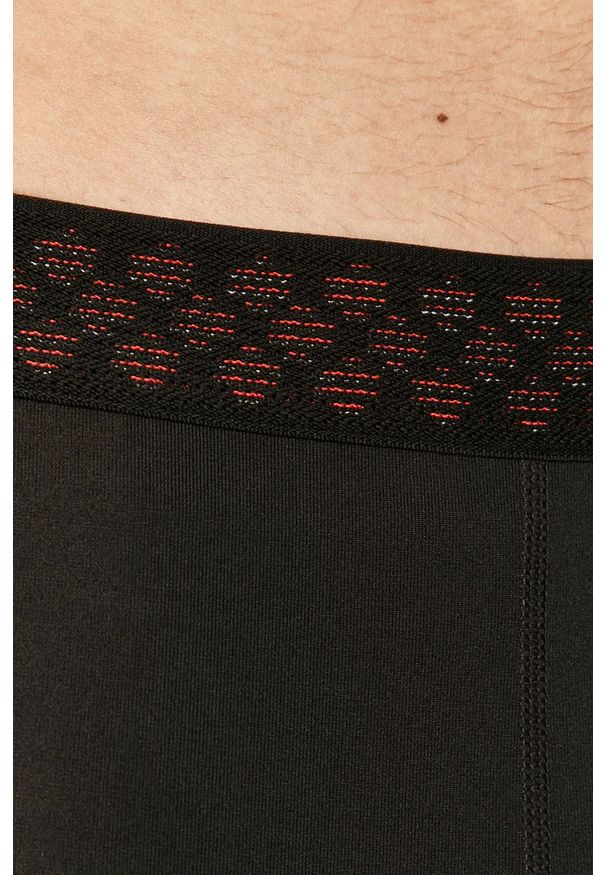 Under Armour - Legginsy. Kolor: czarny. Materiał: dzianina