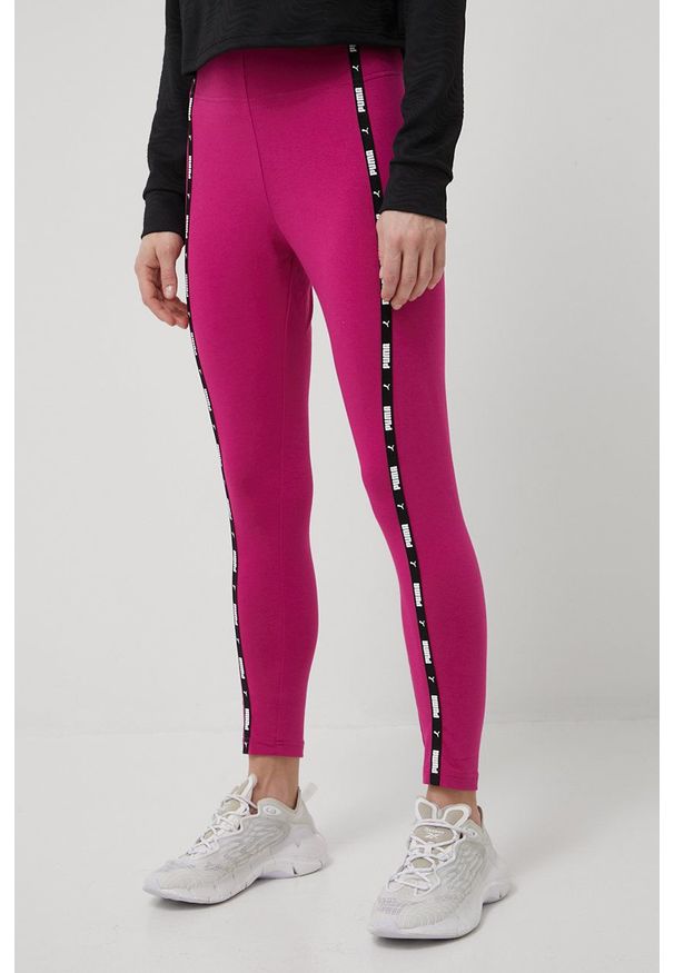 Puma legginsy Power Tape damskie kolor różowy z aplikacją. Kolor: różowy. Materiał: skóra, dzianina, bawełna. Wzór: aplikacja