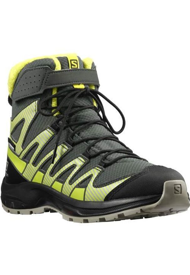 salomon - Buty do chodzenia damskie Salomon Xa Pro V8 Winter Mid Cswp J. Wysokość cholewki: za kostkę. Zapięcie: rzepy. Kolor: szary. Materiał: guma, syntetyk, tkanina, materiał. Szerokość cholewki: normalna. Styl: sportowy