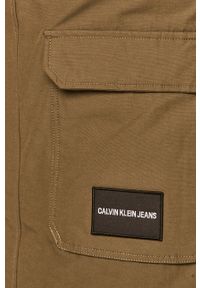 Calvin Klein Jeans - Parka puchowa. Typ kołnierza: kaptur. Kolor: zielony. Materiał: puch. Wzór: gładki #3