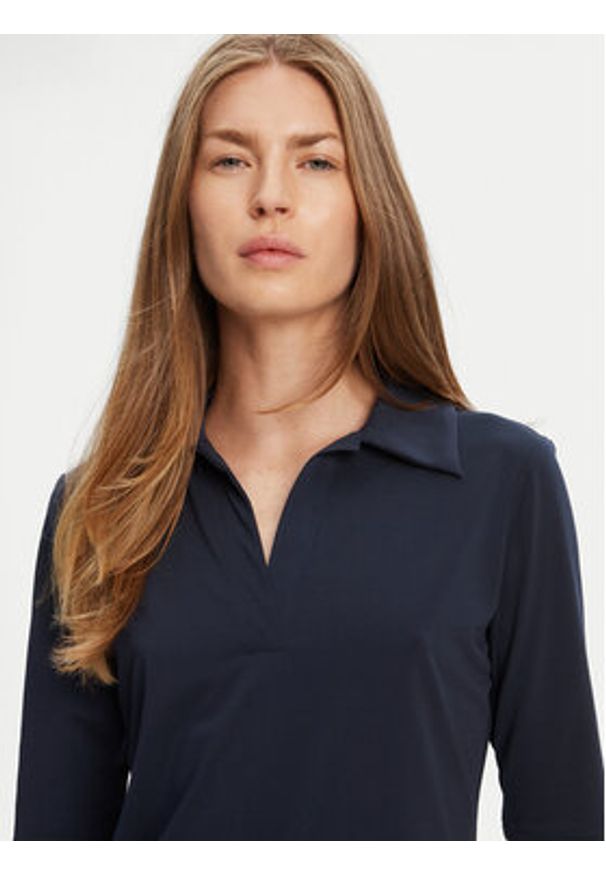 Calvin Klein Polo LV044C221G Granatowy Slim Fit. Typ kołnierza: polo. Kolor: niebieski. Materiał: syntetyk