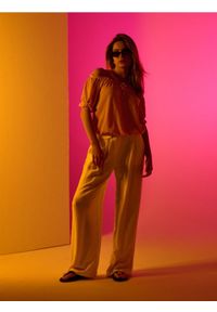 Sinsay - Wiskozowe spodnie wide leg - żółty. Kolor: żółty