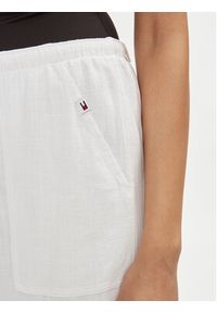 Tommy Jeans Spodnie materiałowe Harper DW0DW17965 Biały Relaxed Fit. Kolor: biały. Materiał: len, wiskoza