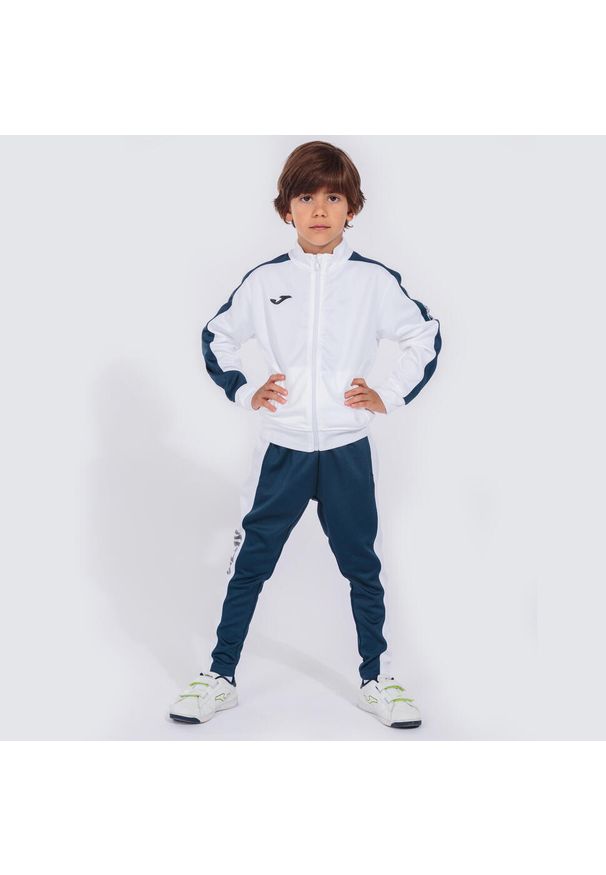 Dres do piłki nożnej dla dzieci Joma Academy III. Kolor: biały, wielokolorowy, niebieski. Materiał: dresówka