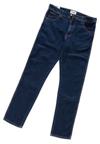 Wrangler - WRANGLER TEXAS SLIM MĘSKIE SPODNIE JEANSOWE CROSS GAME W12S8311U 112126497. Stan: podwyższony #4