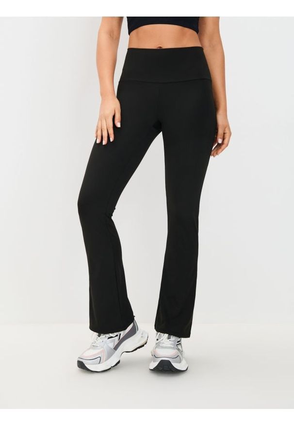 Sinsay - Legginsy flare GYM HARD - czarny. Kolor: czarny