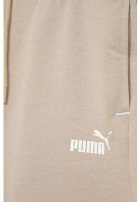 Puma szorty bawełniane 848405 kolor beżowy gładkie. Okazja: na co dzień. Stan: podwyższony. Kolor: beżowy. Materiał: bawełna. Wzór: gładki. Styl: casual #3