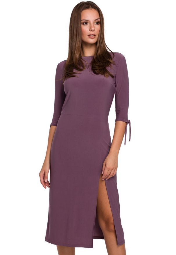 Makover - Elegancka sukienka prosty fason z rozcięciem. Okazja: na co dzień. Materiał: dzianina. Wzór: gładki. Typ sukienki: proste. Styl: elegancki, casual. Długość: midi