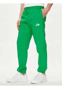 The North Face Spodnie dresowe Essential NF0A7ZJB Zielony Regular Fit. Kolor: zielony. Materiał: bawełna, syntetyk