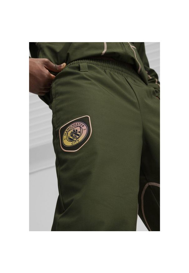 Puma - Męskie spodnie dresowe ftblSTATEMENT Manchester City PUMA. Kolor: różowy. Materiał: dresówka