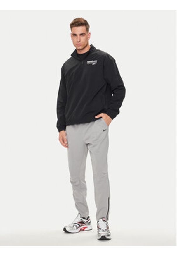 Reebok Kurtka anorak Identity Brand Proud 100076463 Czarny Regular Fit. Kolor: czarny. Materiał: syntetyk