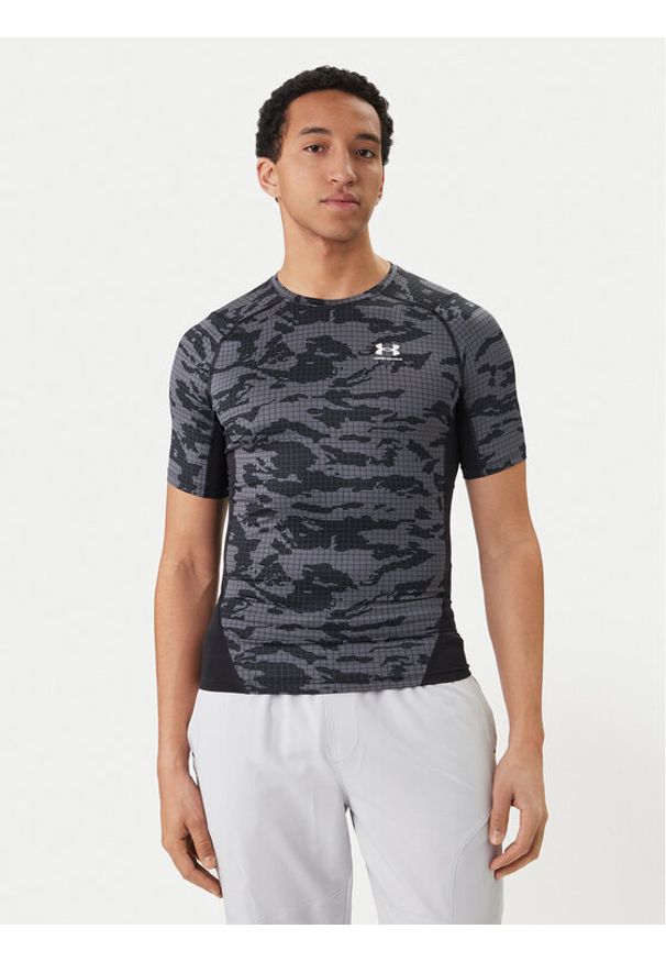 Under Armour Koszulka techniczna HeatGear® Printed 6009657 Czarny Slim Fit. Kolor: czarny. Materiał: syntetyk