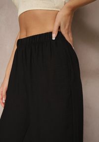 Renee - Czarne Spodnie Palazzo o Szerokim Kroju High Waist Ollevia. Okazja: na spotkanie biznesowe, na co dzień. Stan: podwyższony. Kolor: czarny. Materiał: jedwab. Wzór: aplikacja. Styl: elegancki, biznesowy, casual #4