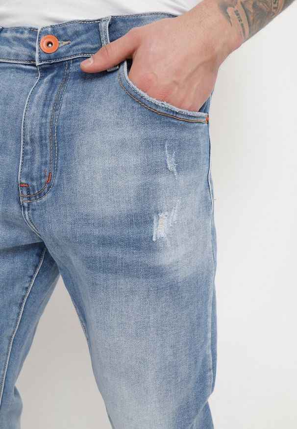 Born2be - Niebieskie Jeansy Skinny z Przeszyciami z Kieszeniami i Suwakiem Skili. Kolor: niebieski. Wzór: aplikacja