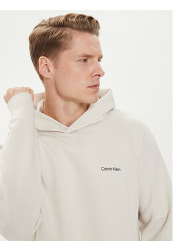 Calvin Klein Bluza Micro Logo K10K109927 Beżowy Regular Fit. Kolor: beżowy. Materiał: bawełna, syntetyk