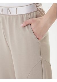 EA7 Emporio Armani Spodnie dresowe 7W001154 AF12501 U6225 Beżowy Regular Fit. Kolor: beżowy. Materiał: syntetyk #4