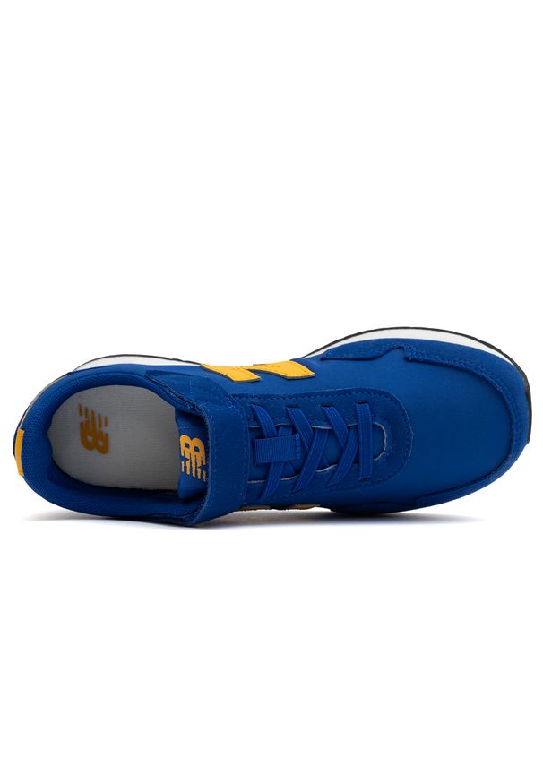 Buty dziecięce New Balance PV323AD – niebieskie. Okazja: na co dzień, na uczelnię. Kolor: niebieski. Materiał: syntetyk, materiał. Szerokość cholewki: normalna