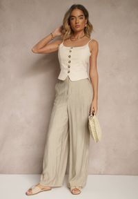 Renee - Beżowe Spodnie o Szerokim Kroju High Waist Natoreia. Okazja: na co dzień. Stan: podwyższony. Kolor: beżowy. Styl: klasyczny, casual, boho, elegancki