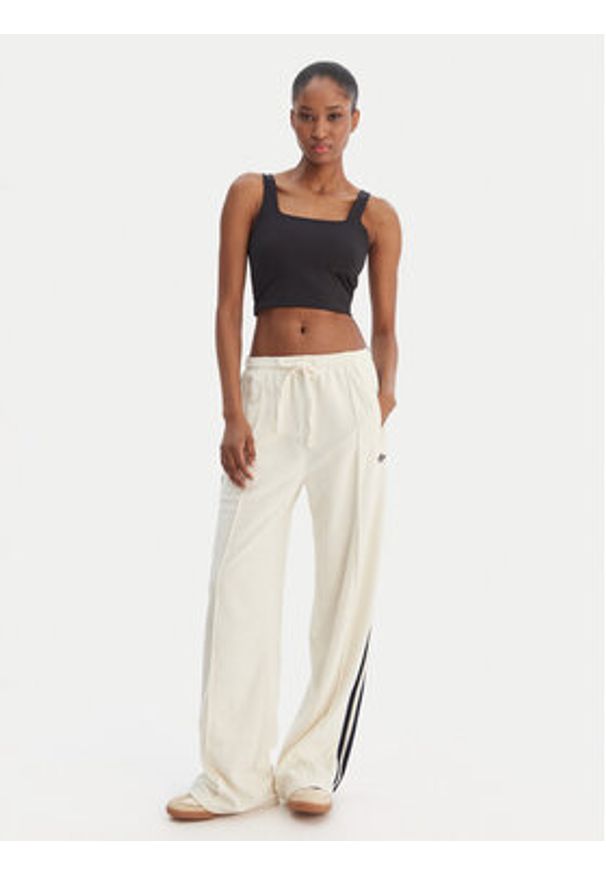 Adidas - adidas Spodnie dresowe Terry Towel Firebird KQ6663 Écru Loose Fit. Kolor: kremowy. Materiał: bawełna