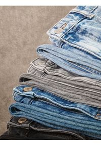 Reserved - Jeansy baggy fit - niebieski. Kolor: niebieski