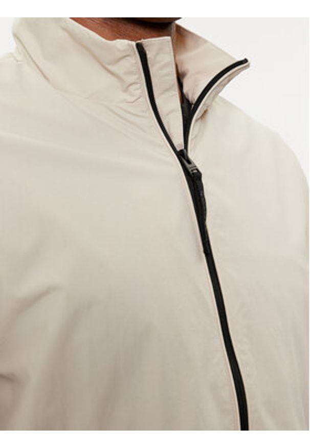 Calvin Klein Kurtka przejściowa K10K111441 Beżowy Regular Fit. Kolor: beżowy. Materiał: syntetyk